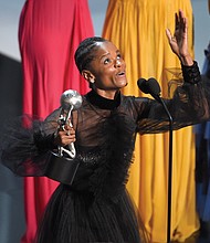 Letitia Wright accepts the award for outstanding breakthrough performance in a motion picture for her role in “Black Panther” at the NAACP Image Awards last Saturday in Los Angeles.