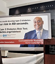 Dr. Paul Klotman and Melissa Edwards, executive director of Central South Texas American Diabetes Association, unveil a mock billboard that promotes the ADA’s type 2 diabetes risk test on Wednesday at a news conference.