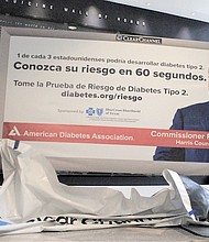 Dr. Jerald L. Zarin, medical director of Medicaid and government programs at Blue Cross Blue Shield of Texas, left, Harris County Commissioner Rodney Ellis, Baylor College of Medicine President and CEO