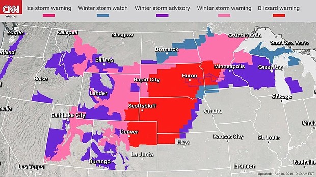 Storm warnings and blizzard conditions extended to at least 12 states, the National Weather Service said. Officials urged drivers to be cautious, with states such as South Dakota warning people in some counties to stay off the roads completely.
