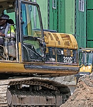 Jackson Ward transforming: The $32 million Jackson Place development is rolling onward in Jackson Ward. This view from 1st and Jackson streets shows the fast pace of development on the 3.4-acre property that began in mid-July. When complete, the project is to include 154 apartments, including 72 replacement units for residents of nearby Fay Towers and 82 units for other renters. (Sandra Sellars/Richmond Free Press)