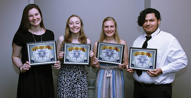 Dr. Felecia Friend-Harris, president of the Virginia Area Chapter of Pi Lambda Theta, an education honor society and professional association, congratulates the organization’s book and scholarship award winners. The honorees are, from left, Maeve Hall of Monacan High School, who will be attending the University of Richmond; April Zoppa of Thomas Dale High School, who will attend James Madison University; Laney Hausler of Manchester High School, who will attend the College of William & Mary; and Brian Cruz-Lovo of James River High School, who will attend Virginia Commonwealth University. (Rudolph Powell)