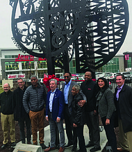 A dedication ceremony was recently held for The Wonder of Woodlawn, a new 17-foot sculpture on the corner of 61st Street and Cottage Grove Avenue. Photo Credit: Katherine Newman