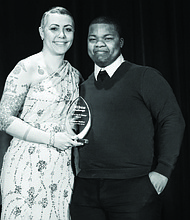 Michelle Morales, CEO of Mikva Challenge IL (left) and Trevon Walker (right) with his 2019 Youth Change Maker Award. Photo Credit: Mikva Challenge