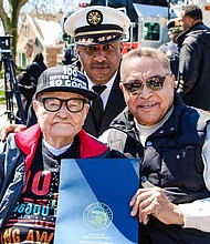 During the street renaming celebration, the Mayor of the Village of Dolton, Riley Rogers (right), read part of the resolution presented by the Cook County Board that shared the accomplishments and legacy of Wayne Adams Sr. (left) who recently turned 100 years old. Photo Credit: Village of Dolton