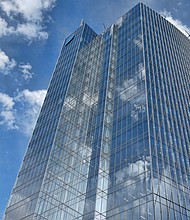 This sleek, 20-story glass tower rises 413 feet into the sky in the block bounded by Cary, Canal, 6th and 7th streets in Downtown. When completed, this latest addition to the city’s skyline, now dubbed Canal Place, will house employees of Dominion Energy. The building has been two years and more than $250 million in the making and is the first of two towers the company plans to construct. A similar, 17-story tower is proposed next door on the property that now houses Dominion Energy’s One James Center building. (Sandra Sellars/Richmond Free Press)