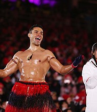 Pita Taufatofua of Tonga stands on stage during the Closing Ceremony of the PyeongChang 2018 Winter Olympics on February 25, 2018.