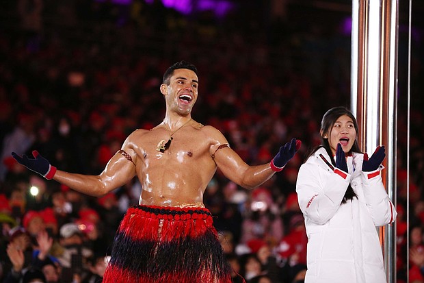 Pita Taufatofua of Tonga stands on stage during the Closing Ceremony of the PyeongChang 2018 Winter Olympics on February 25, 2018.