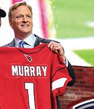 Kyler Murray poses with Roger Goodell