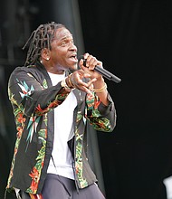 Performer Pusha T of Virginia Beach plays to the  audience.