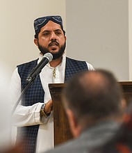 Imam Irfan Ali Shah of the Islamic Center of Henrico offers prayers in remembrance of the victims of the Easter Sunday bombings at three Christian churches and three luxury hotels in Sri Lanka that claimed the lives of more than 250 people and wounded 500 others. (Regina H. Boone/Richmond Free Press)