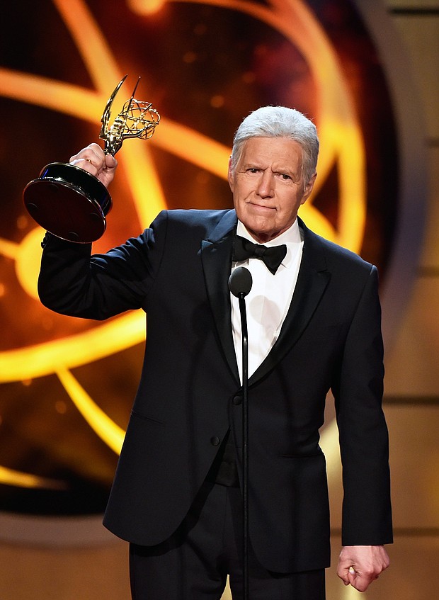 Alex Trebek accepts the Daytime Emmy Award for Outstanding Game Show Host onstage during the 46th annual Daytime Emmy Awards at Pasadena Civic Center on Sunday in Pasadena, California.