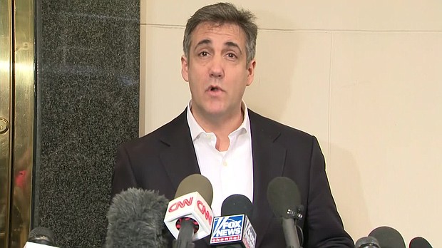 Michael Cohen speaks to reporters before he begins his three-year sentence in federal prison.