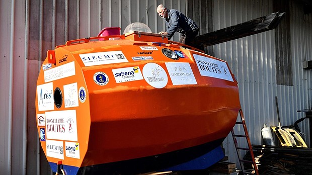 A French man who has spent more than four months floating across the Atlantic Ocean in a giant orange barrel has arrived at his Caribbean destination.