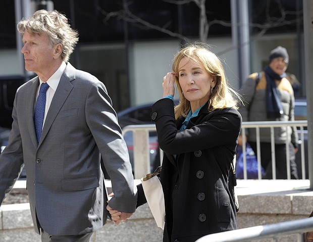 Felicity Huffman is expected to plead guilty Monday to paying $15,000 to a fake charity that facilitated cheating for her daughter's SATs.