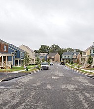 This 2013 photo shows a portion of the newly opened Highland Grove mixed-income apartment community in Highland Park that replaced the 60 units of public housing in what previously was known as Dove Court. The community that nestles Dove and 1st streets also replaced Carrington Gardens, a decaying privately owned apartment complex.