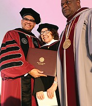 Barbara Radcliffe Grey, a VUU alumna and longtime director of the VUU Museum Art Galleries, is presented with an honorary degree from VUU President Hakim J. Lucas, left, and Dr. W. Franklyn Richardson, chairman of the VUU Board of Trustees.