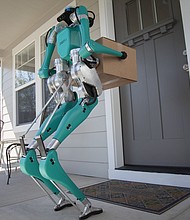 Ford, best known for its cars, pick-up trucks and SUVs, is experimenting with something totally different: a package-carrying robot.