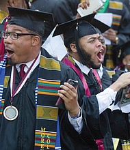 Shocked graduates, above, stand and cheer after commencement speaker billionaire technology investor and philanthropist Robert F. Smith, right, announces his family will provide a grant to eliminate the student debt of Morehouse College’s entire 2019 graduating class, a gift valued at roughly $40 million.