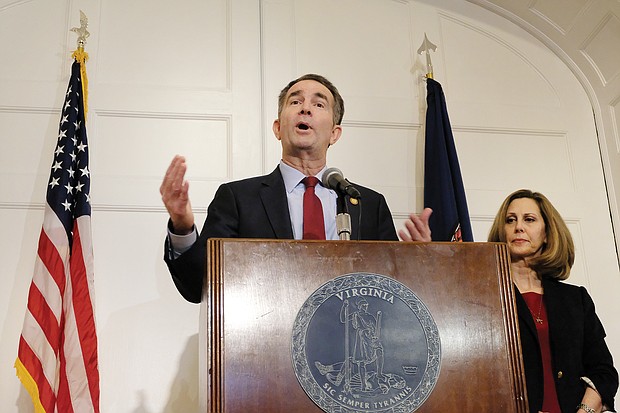 After apologizing a day earlier, the governor backpedals during a Feb. 2 news conference at the Executive Mansion, saying that he is neither person in the racist photo on his yearbook page. However, he admitted during the news conference that he wore blackface to portray superstar Michael Jackson during a 1984 dance contest. First Lady Pam Northam listened in the background.