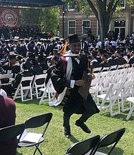 Monte Hathaway of Henrico County is all smiles after receiving his bachelor’s degree — and a surprise gift of payment of his $10,000 student loan debt — during Sunday’s commencement ceremony at Morehouse College in Atlanta.