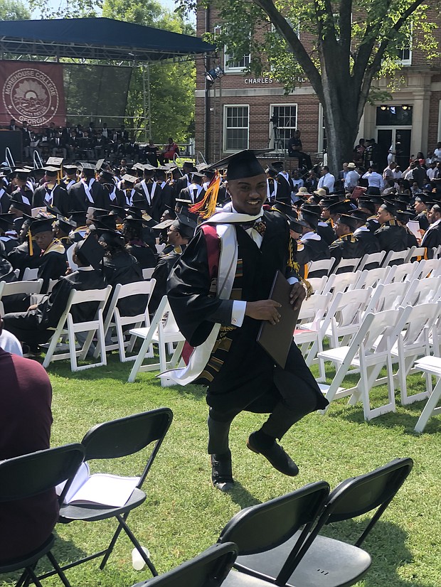 Monte Hathaway of Henrico County is all smiles after receiving his bachelor’s degree — and a surprise gift of payment of his $10,000 student loan debt — during Sunday’s commencement ceremony at Morehouse College in Atlanta.