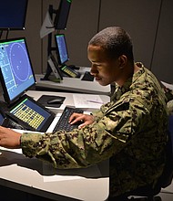 Operations Specialist Seaman Recruit Dave Booker