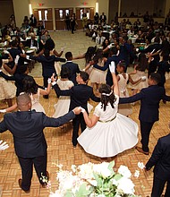 Enchanted by the dance
Forty-six middle school students from the Richmond and Tidewater areas enjoy the art of the dance at the 7th Annual Richmond Renaissance Junior Cotillion sponsored by the James River Virginia Chapter of Jack & Jill of America on May 18. Theme for the cotillion held at First Baptist Church Iron Bridge in Chesterfield County: “The Enchanted Garden.” In the five months leading up to the cotillion, the youths participated in a range of activities promoting civic responsibility, social consciousness, self-discovery and community engagement. In addition to learning formal dances, they completed community service projects, had lessons on etiquette, financial literacy, goal-setting, professional dress and branding and team-building skills. (Photo by Franklin Fitzgerald Photography)