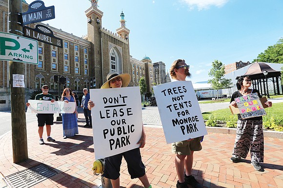 Members of Fans of Monroe Park protest May 17 after credit card giant Capital One is allowed for the fourth ...