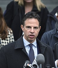 An attorney representing 10 of the families who lost relatives in the Sandy Hook massacre said on Wednesday that he welcomed YouTube's decision to remove videos denying the shooting. However, he said it was "too late to undue the harm" that has been caused to them by conspiracy theories circulating on the platform over the last several years.
