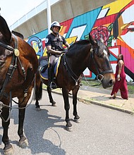 ‘I Have a Dream’ Festival
Music and camaraderie were on display at the “I Have a Dream” Festival near Martin Luther King Jr. Middle School. The event had a purpose: To promote creation of a public park on unused city property that sits at O and 18th streets behind the school and underneath the Martin Luther King Jr. Bridge. Two mounted police officers, Amanda Acuff on Scooter and Gene Carter on Toby, also took part in the festivities. (Regina H. Boone)