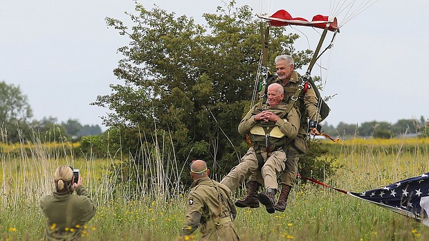 For most people, a summer trip to France is a chance to relax in beautiful surroundings and to savor the country's fine food. For Tom Rice of San Diego, it's an opportunity to relive the time he nearly died jumping from a C-47 Douglas airplane, then was shot at, again and again.