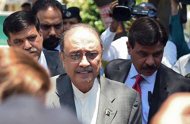 Former Pakistani President Asif Ali Zardari arrives Monday for his bail appeal at Islamabad High Court.