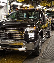A Chevrolet Silverado full-size pickup truck is ready to roll off the assembly line Wednesday, June 12, 2019 at the General Motors Flint Assembly Plant in Flint, Michigan. GM announced today it will invest $150 million at the plant to increase production of the all-new Chevrolet Silverado and GMC Sierra heavy-duty pickups, which begin shipping to dealers this week. (Photo by Jeffrey Sauger for General Motors)