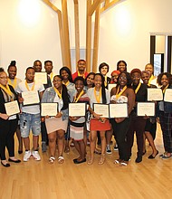 Armstrong High School’s top seniors show off the framed certificates they received at the school’s second annual scholars luncheon held June 4 at the Black History Museum and Cultural Center of Virginia. The 24 scholars all have GPAs of 3.0 or higher. Armstrong Principal Willie J. Bell also presented them with an academic achievement medal and a copy of the Dr. Seuss book, “Oh, the Places You’ll Go!” Armstrong seniors honored at the event: Tar’Quasia Bell, Laura Blackwell (valedictorian), Nia’Sha Burroughs, Alexis Burwell, Jamira Commander, Andromeda Cooper, Keshae Elliotte, Makiah Gayles, Alia Harris, Khaliq Harris, Talil Harvey, Jacob Heinrich, Andre Jackson, Shaijzuan Jones, Precious King, Kiera Lewis, Johnae Macklin-Terry, Kiaira McCray, Joi Miles, Sharnay Moore, Corvell Poag (salutatorian), Damon Robinson, Sameerah Seaman and De’Jah Waller.