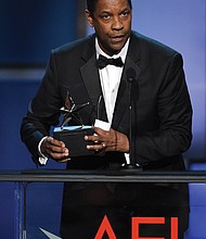 Denzel Washington addresses the audience during the American Film Institute ceremony honoring him on June 6.