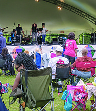 Richmond band Mahogany Soul entertains the crowd at Chimborazo Park last Saturday for the RVA East End Festival. The two-day, free event featured a broad range of musical groups — from Richmond Public Schools groups to the Richmond Symphony. This was the fourth year for the festival, which raises money through individual donations and corporate and foundation support to bolster music and arts programs in city schools in the East End. (Ava Reaves)