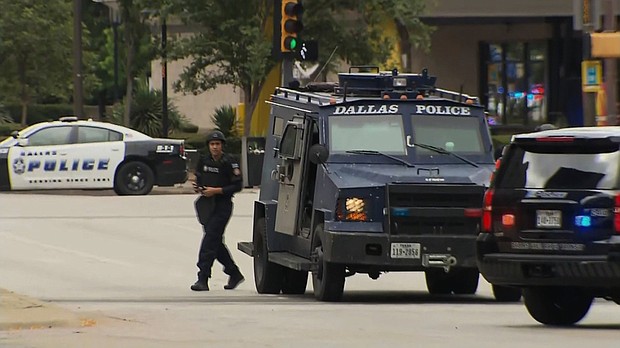 Dallas Police said that a suspect in an "active shooter incident" was shot during an exchange of gunfire with federal officers in downtown Dallas.