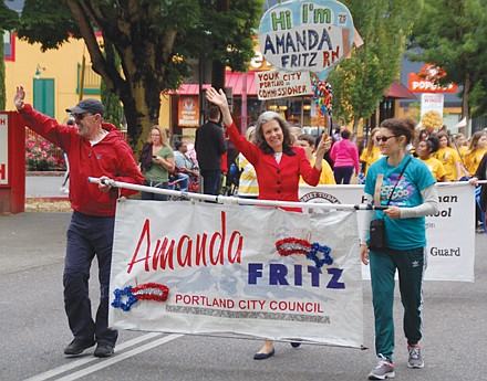 Portland Commissioner Amanda Fritz shares in the community spirit.
