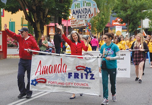 Portland Commissioner Amanda Fritz shares in the community spirit.