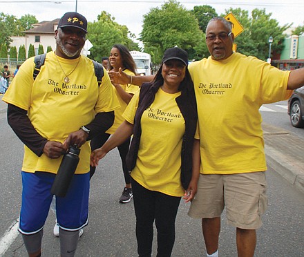 The Portland Observer is represented by Publisher Mark Washington (right) and Michael Mangum and his wife.