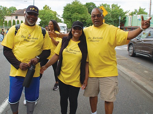 The Portland Observer is represented by Publisher Mark Washington (right) and Michael Mangum and his wife.