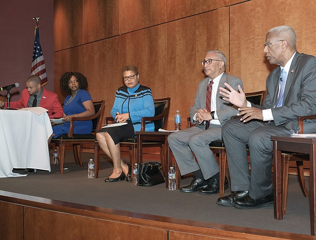 Congressman A. Donald McEachin of Richmond, right, makes a point during the State of Black America Town Hall last Saturday following the Ashe Boulevard dedication ceremony. With him are, from left, moderators Dr. Ravi K. Perry and Samantha Willis, and Rep. Karen R. Bass of California, chair of the Congressional Black Caucus, and Rep. Robert C. “Bobby” Scott of Newport News.