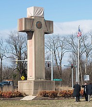 Visitors earlier this year walk around the 40-foot Maryland Peace Cross dedicated to World War I soldiers in Bladensburg, Md.