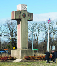 Visitors earlier this year walk around the 40-foot Maryland Peace Cross dedicated to World War I soldiers in Bladensburg, Md.