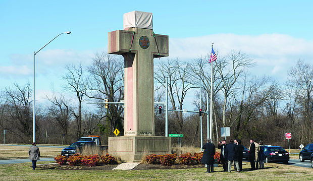 Visitors earlier this year walk around the 40-foot Maryland Peace Cross dedicated to World War I soldiers in Bladensburg, Md.