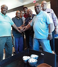 Childhood friends of Arthur Ashe Jr. meet monthly at a Henrico hotel to rekinlde memories and for fellowship. They are, from left, Raymond Lee, Carlton Harris, Lawrence Logan, Frank Turner Jr., Henry “Chico” Brown, Karl Jones and Othello Scott.