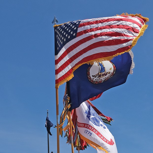 Members of the U.S. Armed Forces Color Guard from Fort Lee present the colors during the ceremony. (Sandra Sellars/Richmond Free Press)