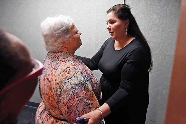 Susan Bro, left, mother of Heather Heyer who was killed in August 2017 while counterprotesting during a white supremacist rally in Charlottesville, gets a hug from a supporter after the June 28 federal court sentencing of James A. Fields Jr. in Ms. Heyer’s death.