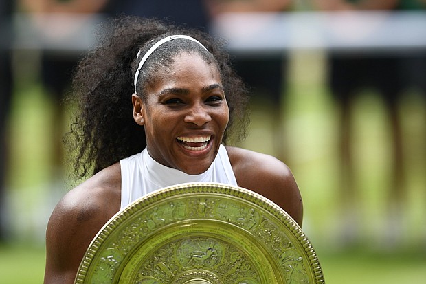 Serena Williams reached her 12th Wimbledon semi final with a gritty three-set victory against fellow American Alison Riske on Centre Court/Source:	Glyn Kirk/AFP/Getty Images